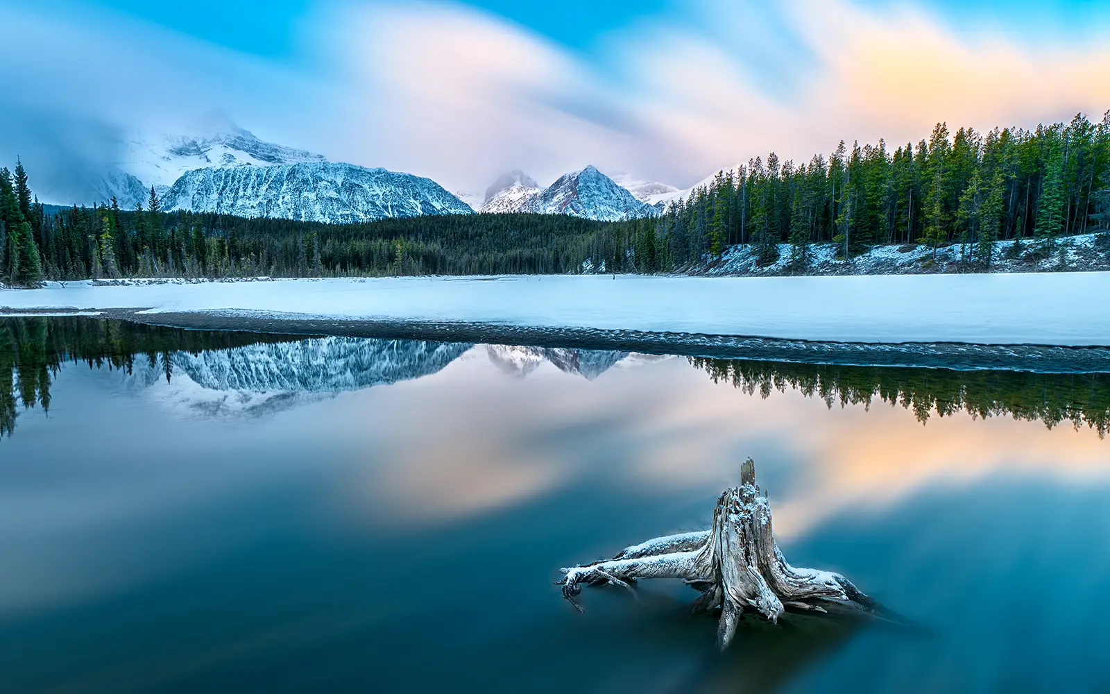 Scene of an Alberta lake in the early morning.